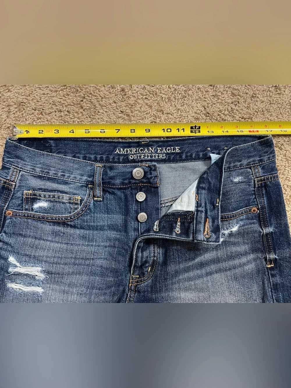 Women’s American Eagle blue jean denim destructed cutoff shorts size 10/12 -READ